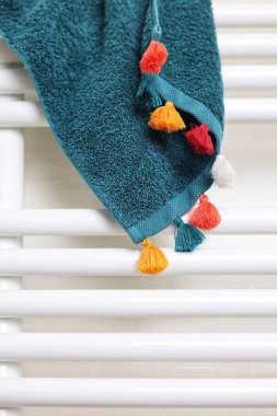 PARIS, FRANCE - 04 October 2025: A terry towel on a radiator in the bathing room