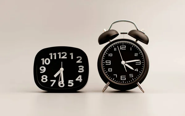 Black clock on gray background, time concept that matters to life and work.