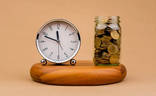 money and time savings coins in a glass jar invest financial investment Cash Loan, Home Loan, Cash Flow, Salary, Money and Financial Investments.