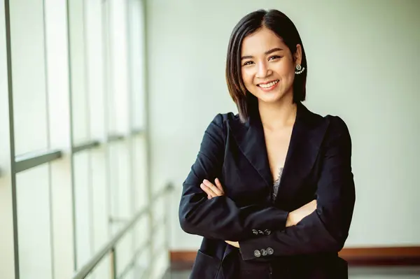 young business woman Strong energy to be successful in business, work and making money, joy, smile, confidence and good vision and a good work strategy.