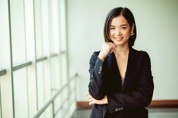 young business woman Strong energy to be successful in business, work and making money, joy, smile, confidence and good vision and a good work strategy.
