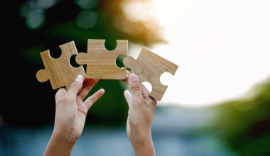 Yapboz parçaları önemli bileşenler iyi iş enerjisi, bağlantı, iletişim. ve mükemmellik, takım çalışması konsepti