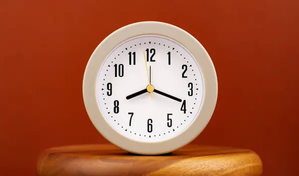 Time and work in daily life Photo of a modern clock in a high quality photo studio.