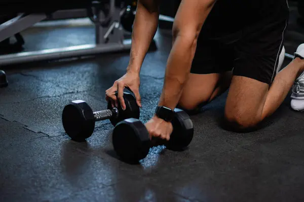 Exercise with dumbbells Lift weights to build strong arm muscles, an activity for good physical health.