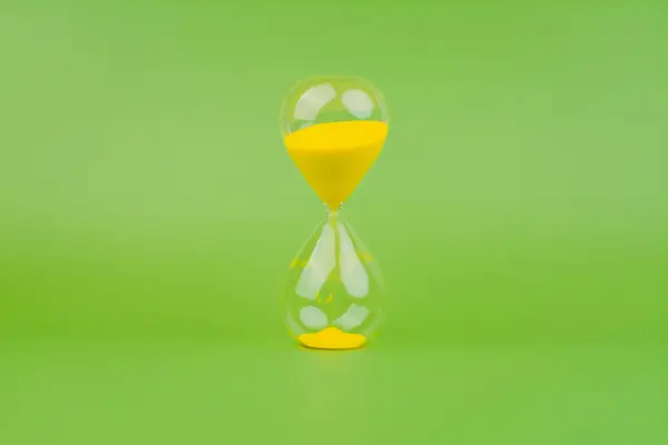 Hourglass, colorful countdown, time limit, time concept and importance of spending time.