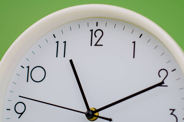 Time and the law of time, the limits of work, a stationary hand, studio photography, time concept.