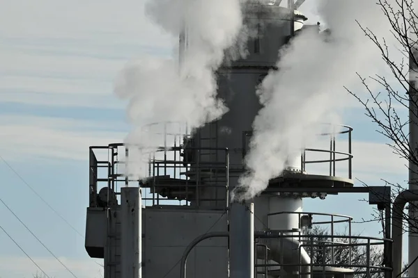 A view of smoke from a factory chimney.