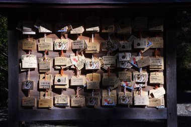 'Ema' ( Votive picture tablet ) in the Japanese shrine. Ema is a small wooden tablet that people write down their wishes and dedicate it to the shrine.