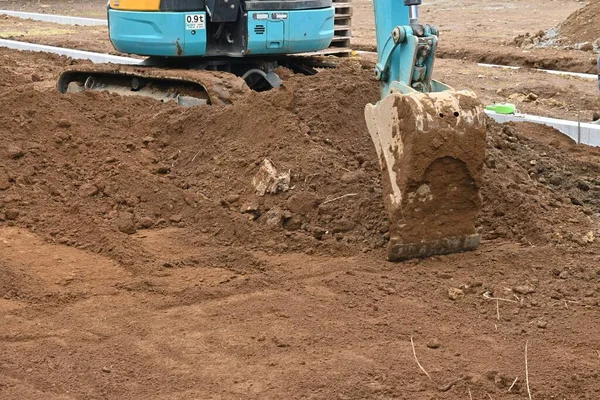 A view of a foundation construction site for a residential building.