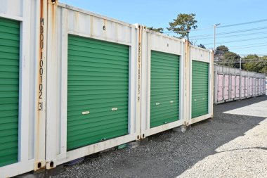 The rental self storage room unit. This is a rental storage space for temporary or long-term luggage storage, popular for outdoor and sporting goods, as well as books and off-season clothing. clipart