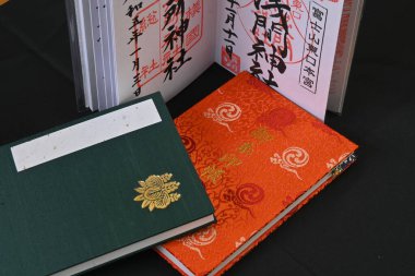 'Goshuin', as it is called in Japan, is a seal that is handwritten by a monk and is given to worshipers at shrines and temples. Also, the notebook used for goshuin is called 'Goshuincho'. clipart