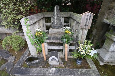 Japan Travel Guide. Gichu-ji temple, Otsu, Shiga Prefecture. The graves of the warlord Kiso Yoshinaka and the haiku poet Matsuo Basho are located here. clipart