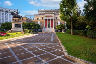 Facade view of the National Academy of Athens neo classical building with the pediment on the theme of the birth of goddess Athena. Statues of Athena and Apollo