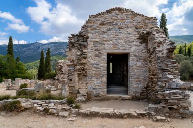 Ayios Marcos temple or Fragomonastiro is a three aisled early Christian basilica with a narthex located at the archaeological site of Taxiarches Hill in Kaisariani district, Athens, Greece, facade