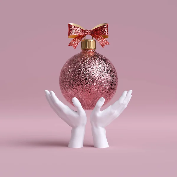 3d white mannequin hands holding rose gold Christmas tree ball ornament decorated with bow, isolated on pink background. Holiday fashion concept. Festive clip art.