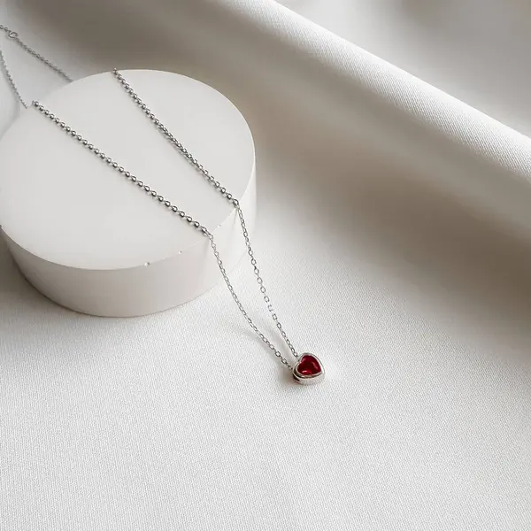 Gümüş mini kalp doğum taşı kolyesi..