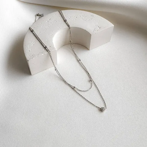 Gümüş çift zincirli kalp kolyesi. Sevdiğin için mükemmel bir hediye..