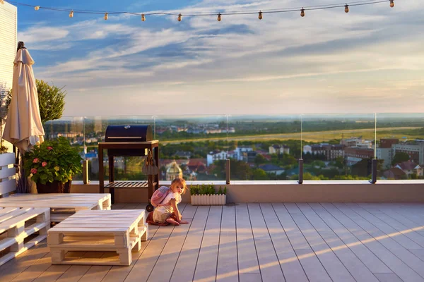 Cute Baby Girl Sitting Sunlit Rooftop Patio Summer Evening Beautiful — Stock Photo, Image