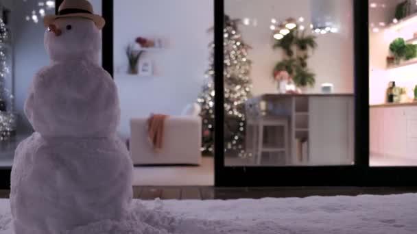 Cute Baby Girl Closes Sliding Doors Cozy Apartment Snowfall Snowman — Stock Video
