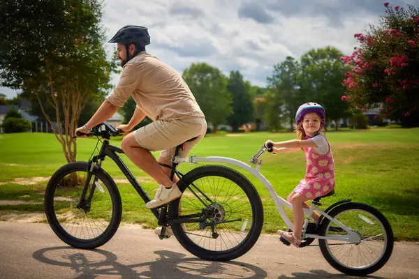 Father Daughter Young Kid Cycling Together Bicycle Towable Bike Trailer Stock Picture
