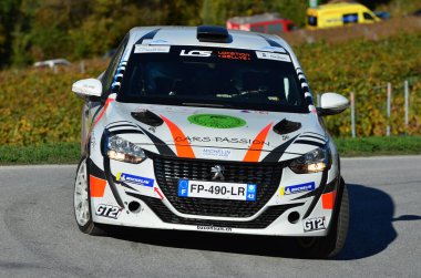 CHALAIS, SWitzERLAND - 15 Ekim: Droz and Lattion in their Peugeot 208 driving the International Ralally du Valais: 15 Ekim 2022, Chalais, İsviçre