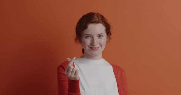 Positive Woman Showing Money Gesture Portrait Attractive Positive Ginger Girl — Stock Video