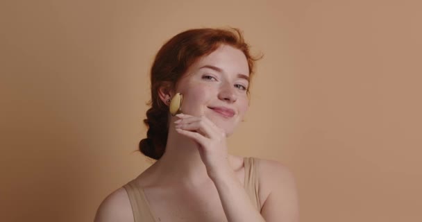 Face Massage Smiling Woman Using Jade Facial Roller Skin Care — Stock Video