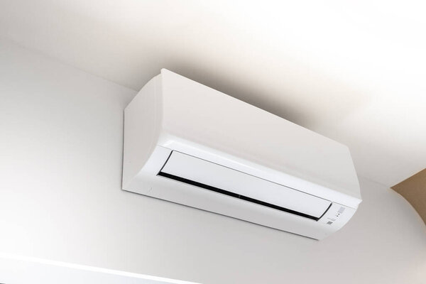 CloseUp White air condition on white wall background in house