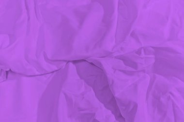 Mor renkli kumaş yüzeylerin yakın çekimi