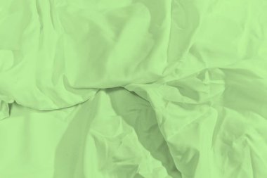 Yeşil renkli kumaş yüzeylerin yakın çekimi