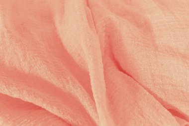 Pembe renkli kumaş yüzeylerin yakın çekimi
