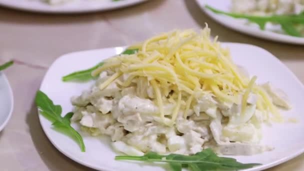 Close Chef Hands Blue Gloves Put Sliced Ingredients Plate Salad — Stockvideo