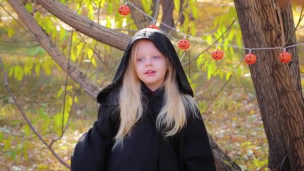 Little Girl Black Cloak Hood Stands Autumn Park Tree Catches — Wideo stockowe