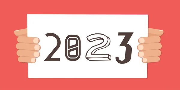 2023サイン入りのお正月旗を持つ手 — ストックベクタ