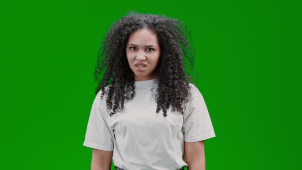 Angry Woman Curly Long Hair Dressed White Tee Looking Camera — Stock Video