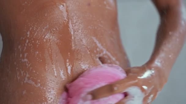 Close Woman Taking Shower Washing Body Holding Pink Wisp Bast — Stock Video