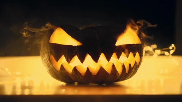 Brightly Lit Pumpkin Its Mouth Wide Open Showcasing Eerie Festive Video Clip