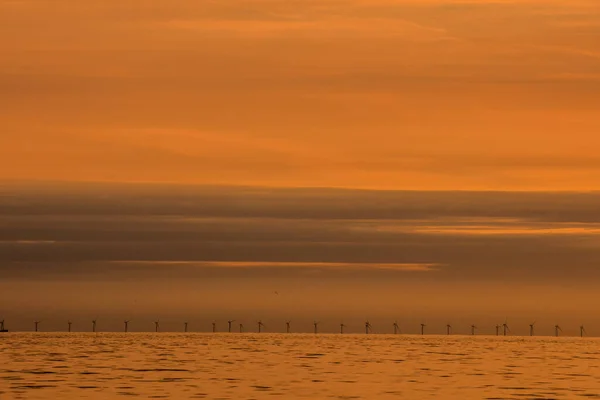 Sun Setting on the Atlantic Ocean in North Europe Holland