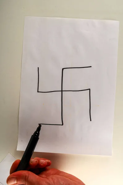 swastika, an ancient religious and cultural symbol, predominantly in various Eurasian, as well as some African and American cultures, now also widely recognized for its appropriation by the Nazi Party and by neo-Nazis