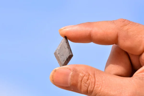 stock image Photo Picture of Semi Precious Rock Stone Jewel in hand 