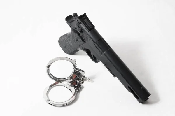 Police Handgun Revolver Handcuff Weapon Concept — Zdjęcie stockowe
