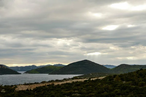 stock image clouds over the sea, beautiful photo digital picture