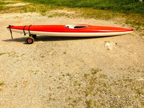 stock image Photo picture of a red kayak on the beach