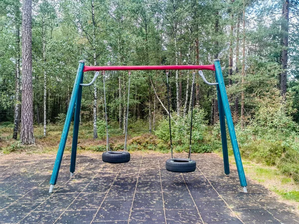 stock image swing in the park , image taken in europe