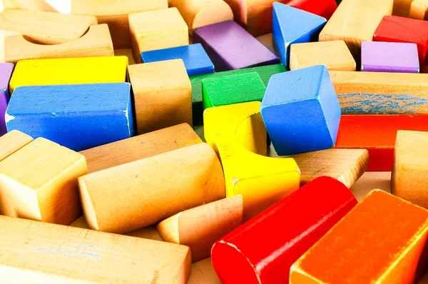 Close-up of colored wooden toy blocks Object on a White Background