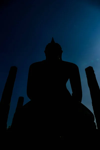 日没時の仏像のシルエット美しい写真デジタル画像 — ストック写真