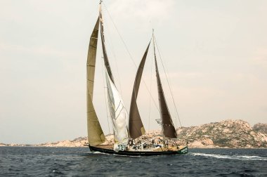 Editorial SARDINIA - SEPTEMBER 2005: Participants in the Maxi Yacht Rolex Cup boat race clipart