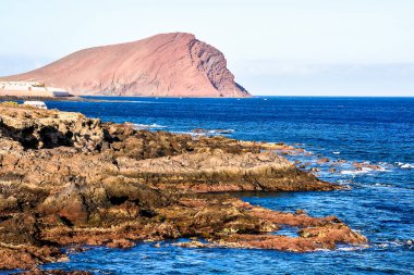 Dry Lava Coast Beach in the Atlantic Ocean clipart