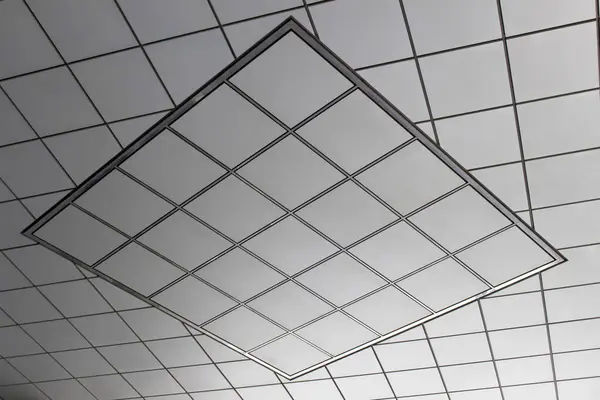 Ceiling design made up of distorted geometric patterns