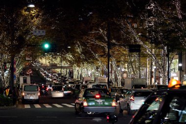 December 5, 2019, Shibuya-ku, Tokyo, JapanOmotesando at night during the Christmas season, glittering with illuminated street trees and car headlights and taillights clipart